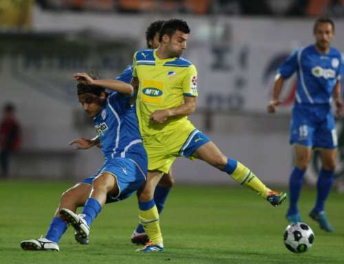 Ivan Trickovski (yellow) in action; photo: 24sports.com.cy